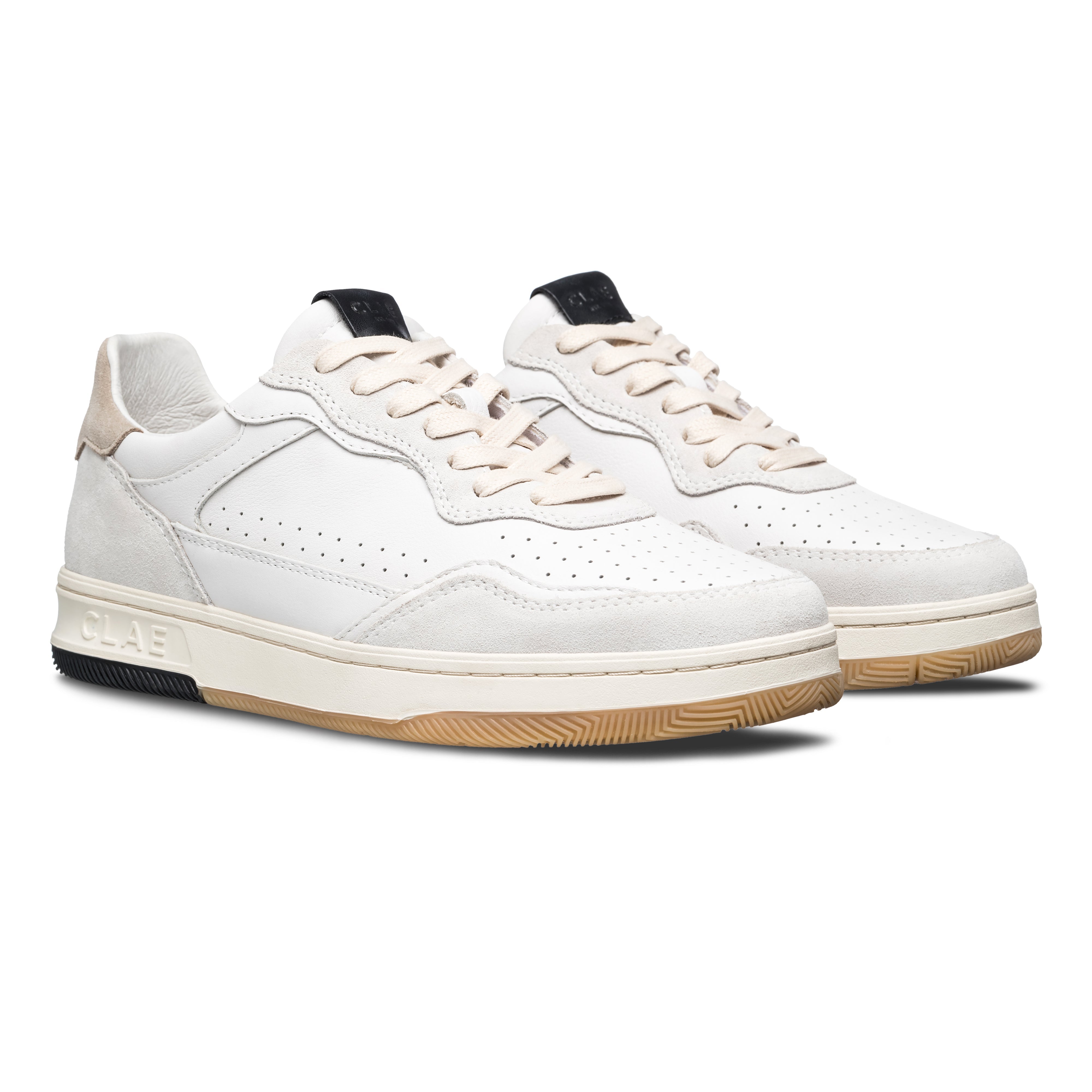 Three-quarter view of Haywood court shoe in White Feather Black, highlighting all-leather construction and premium finish.