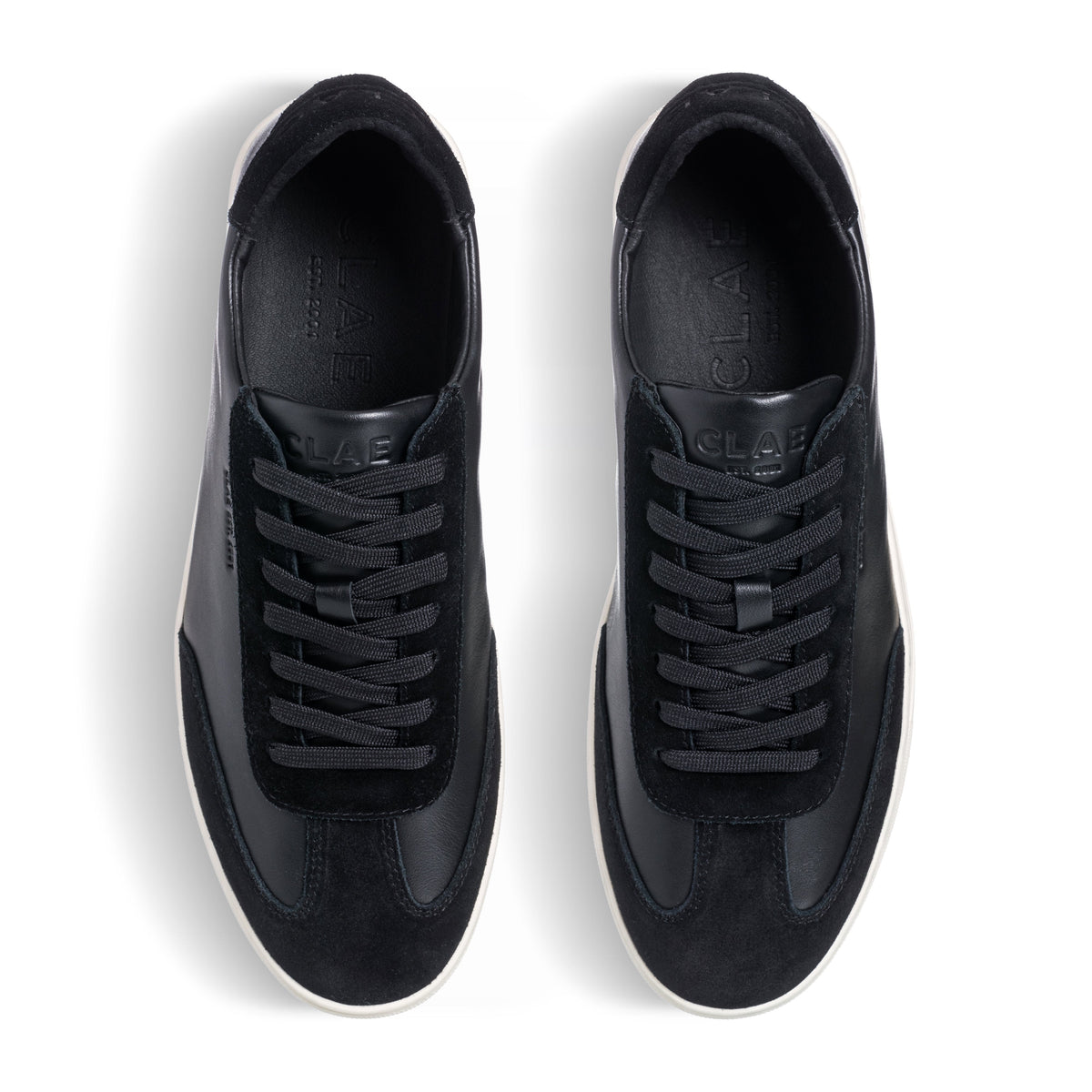Top view of Deane court shoe in Black Off-White, showing suede and Italian leather upper with T-Toe design and lace details.