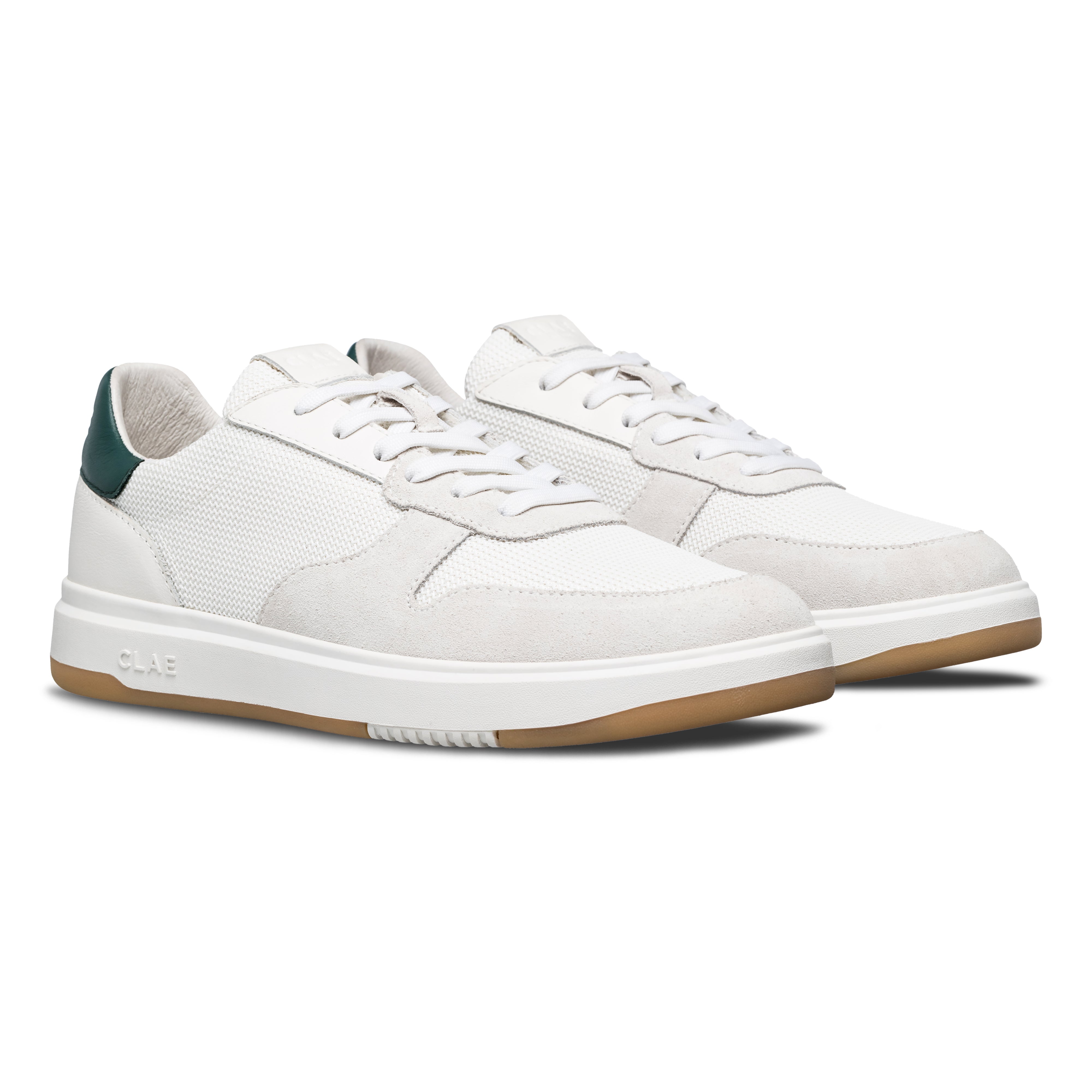 Three-quarter view of Moses sneaker in White Pine Needle, highlighting premium materials and All Court (AC) outsole construction.