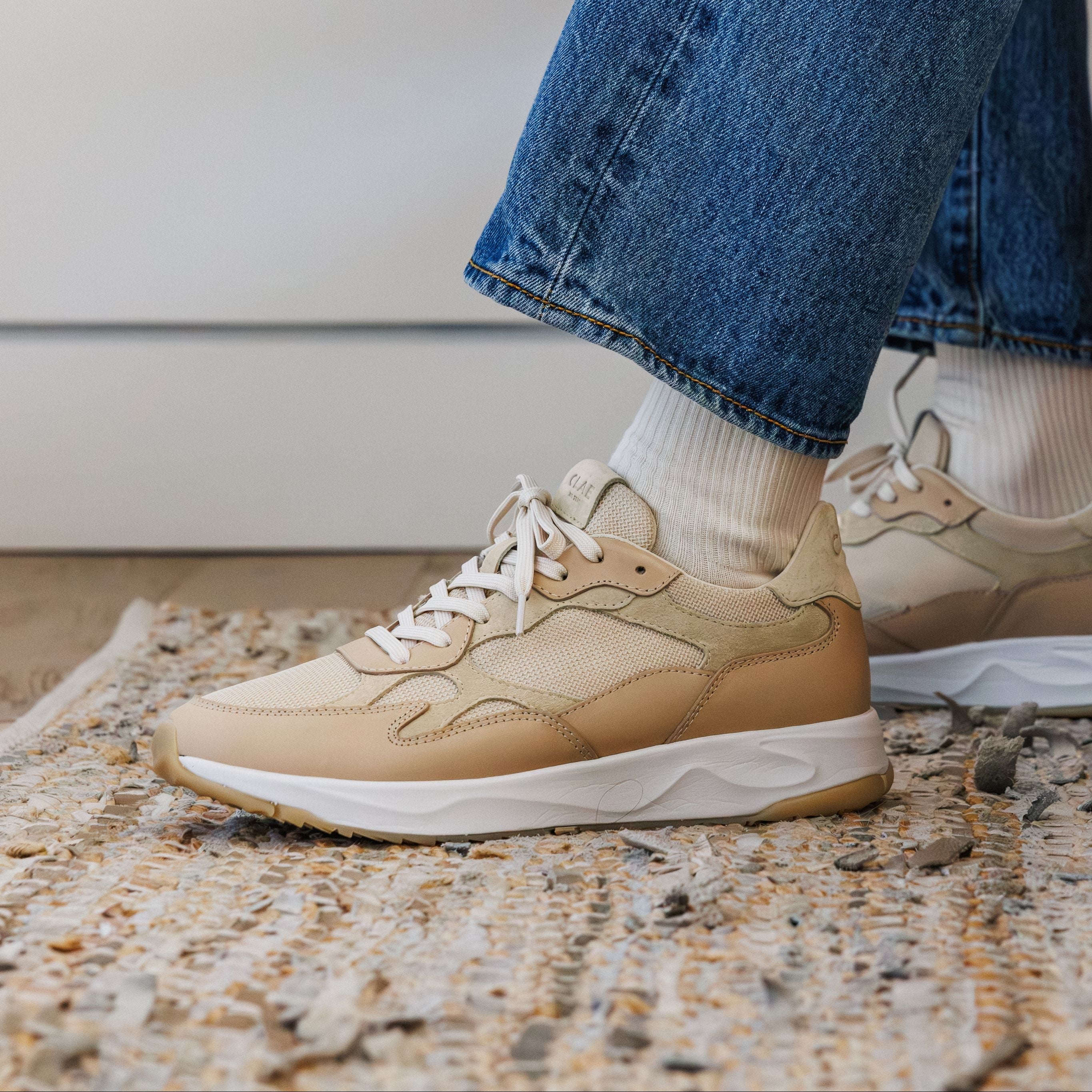 Zuma runner in Vegtan Wood Ash worn in casual lifestyle setting, highlighting comfort, flexible construction, and premium design.