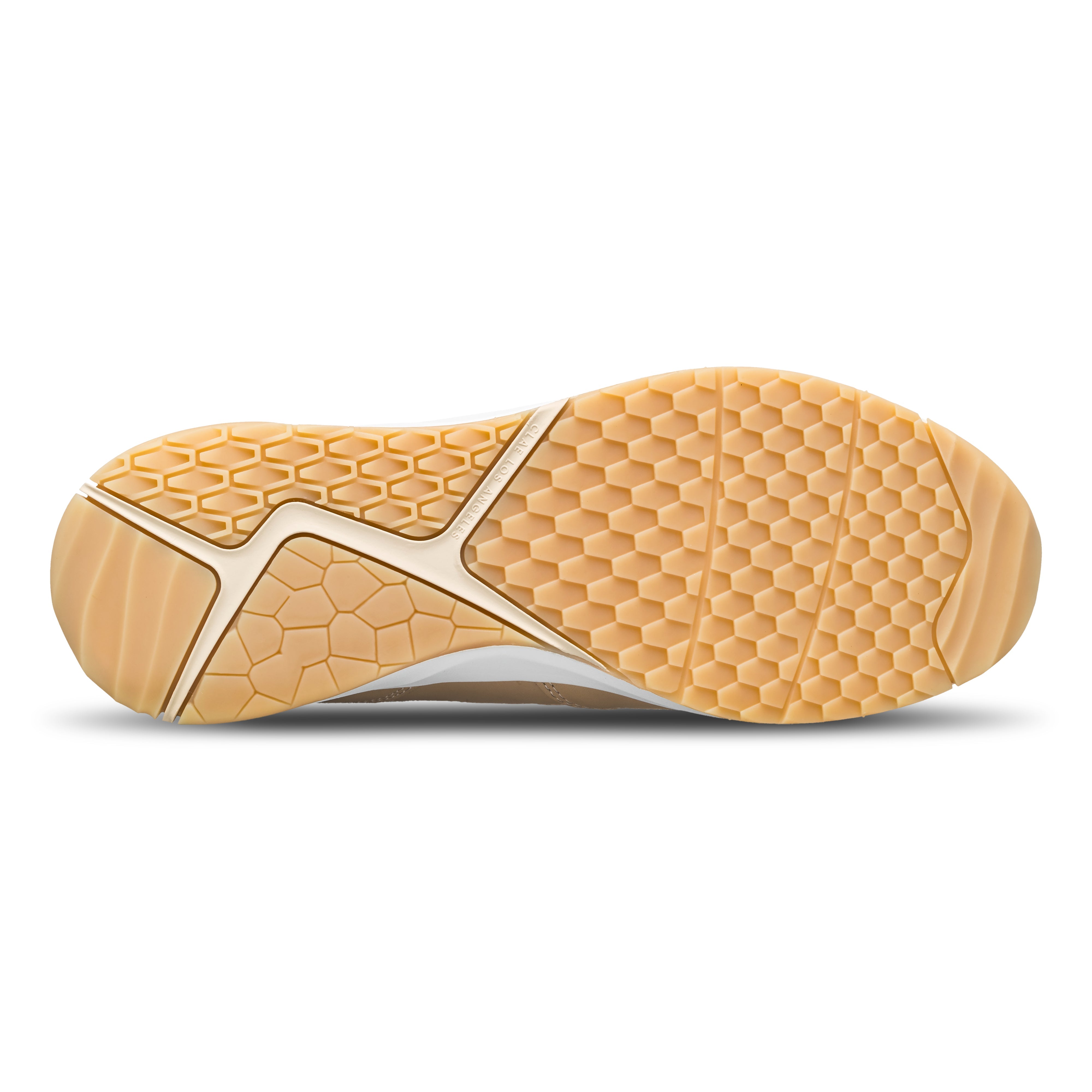 Zuma runner in Vegtan Wood Ash with Desert Track (DT) outsole featuring 3D natural design elements inspired by snake scales, dunes, and rocks, sole view.